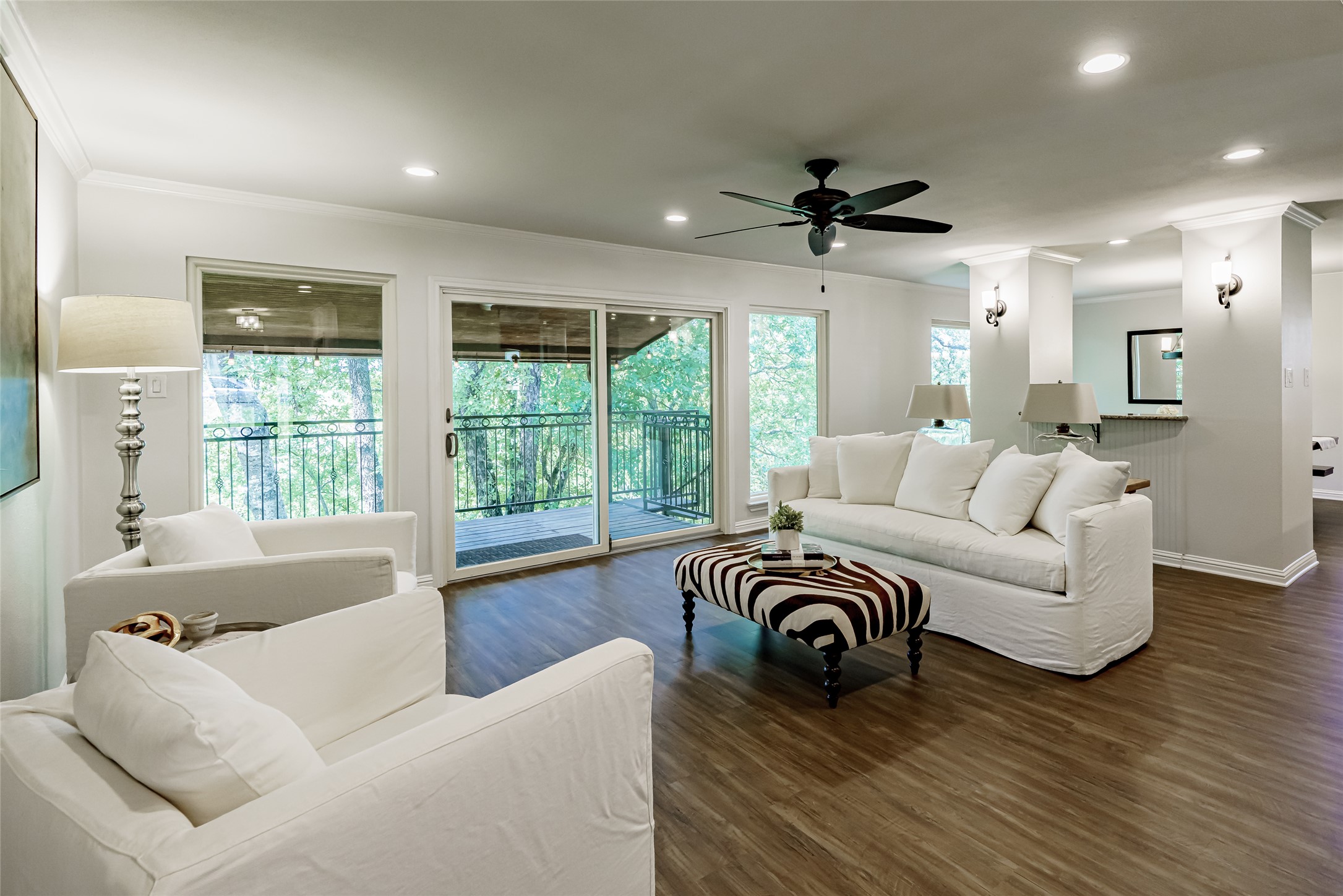 8810 Mountain Path Circle Austin, TX 78759 - Photo 2 of 37 Living area with dark wood-type flooring, crown molding, recessed lighting, and ceiling fan