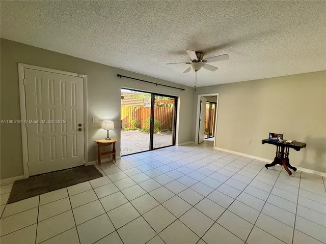 a view of a livingroom with a furniture and a window