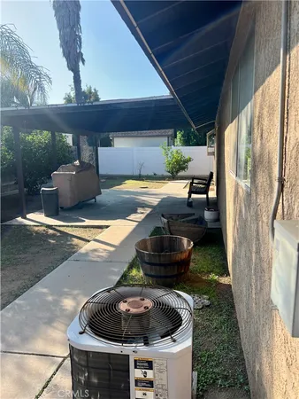a view of a backyard of the house