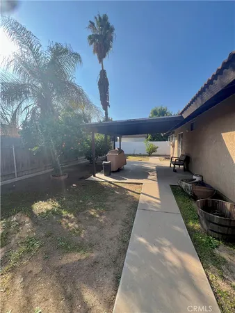 a view of outdoor space with yard and seating area