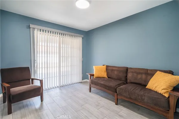 a living room with furniture and a couch