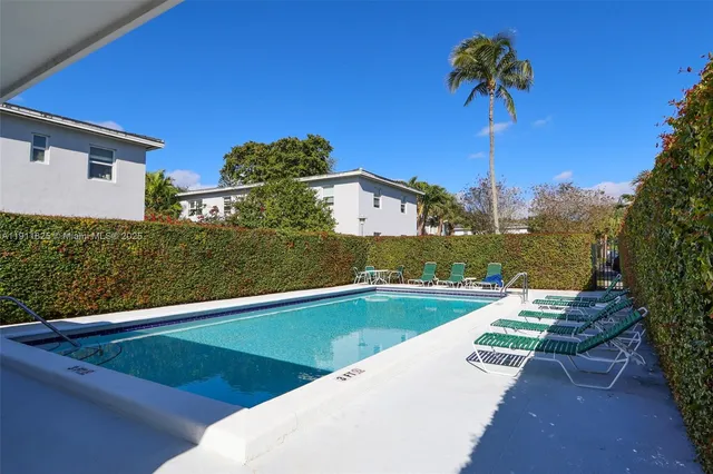a view of a backyard with a garden
