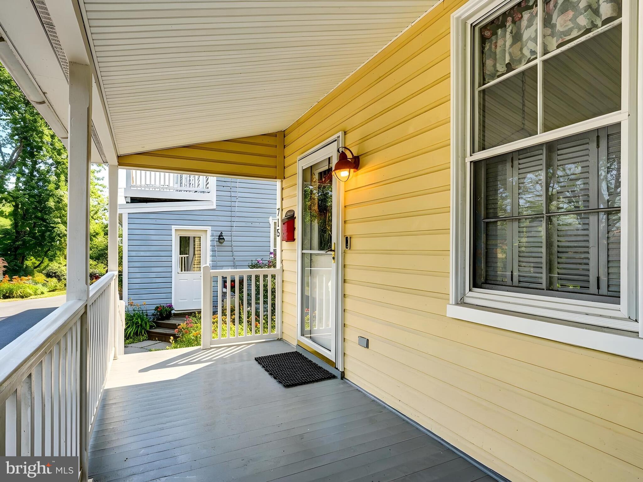 715 Pleasant Hill Road Ellicott City, MD 21043 - Photo 3 of 27 a view of front door and porch