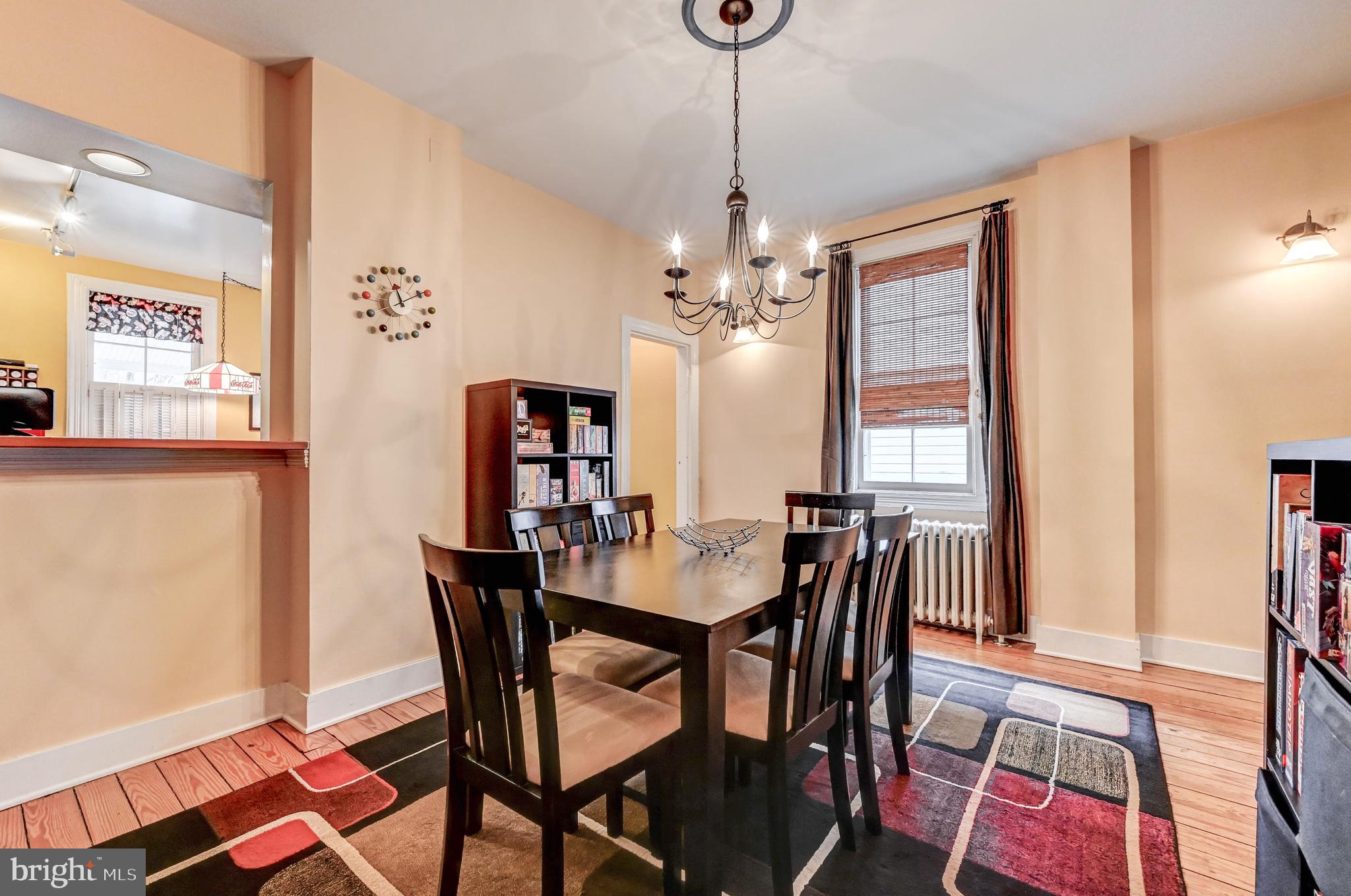 715 Pleasant Hill Road Ellicott City, MD 21043 - Photo 9 of 27 a view of a dining room with furniture and window