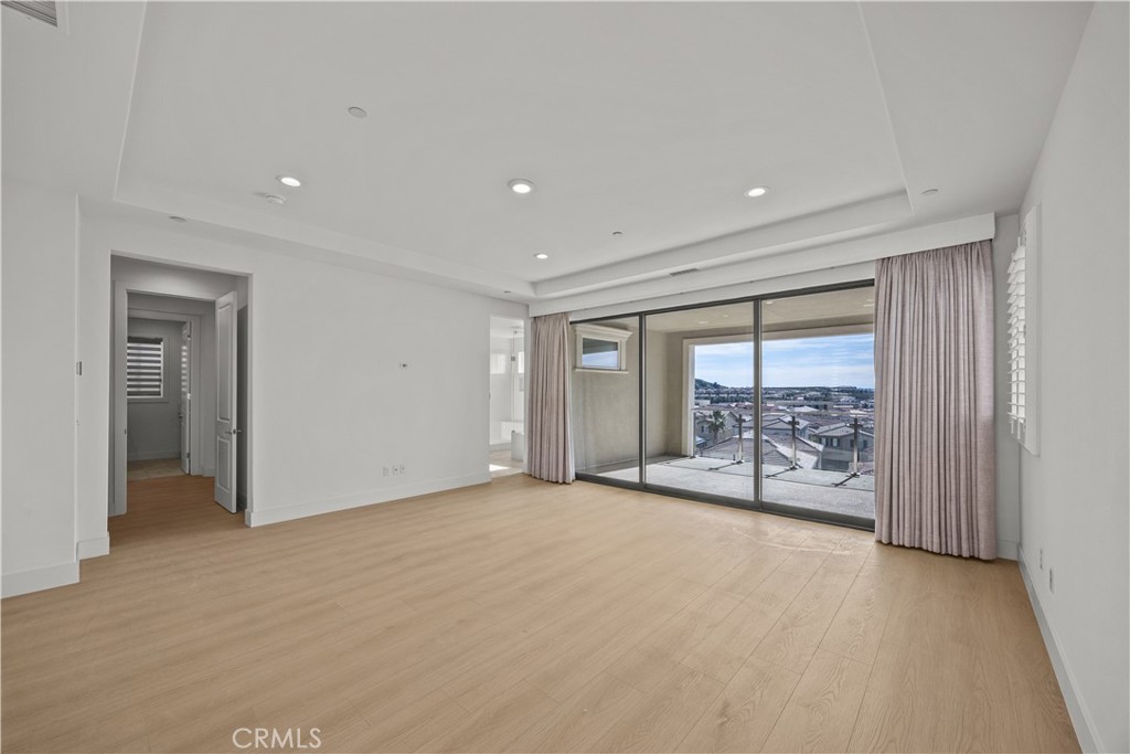 20638 Deer Grass Court Porter Ranch, CA 91326 - Photo 27 of 50 a view of an empty room with a window