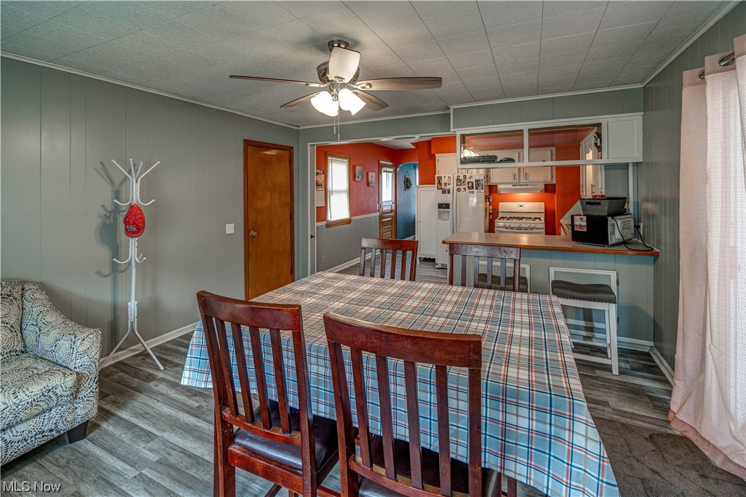 4932 Arbor Road Southwest Canton, OH 44710 - Photo 6 of 31 Dining space with LV/wood floors and ceiling fan