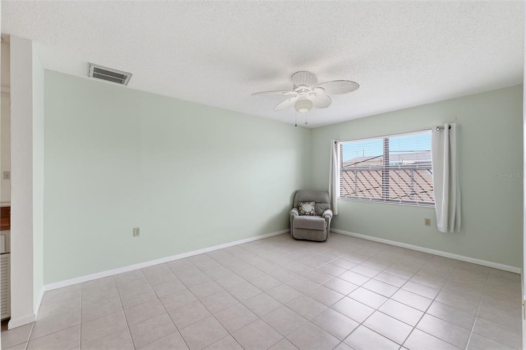 1804 Rising Sun Drive, Unit 1804 Holiday, FL 34690 - Photo 15 of 31 a view of an empty room with a window