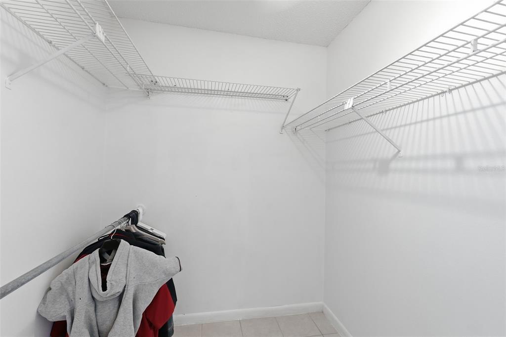 1804 Rising Sun Drive, Unit 1804 Holiday, FL 34690 - Photo 19 of 31 a view of walk in closet