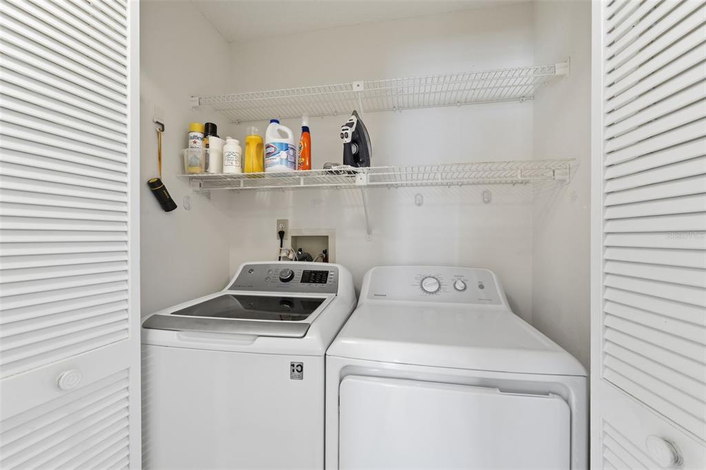 1804 Rising Sun Drive, Unit 1804 Holiday, FL 34690 - Photo 23 of 31 a utility room with dryer and washer