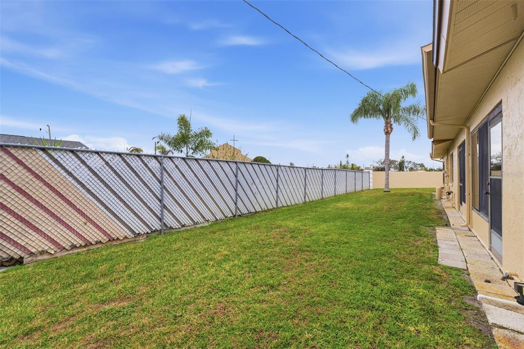 1804 Rising Sun Drive, Unit 1804 Holiday, FL 34690 - Photo 26 of 31 a view of a back yard
