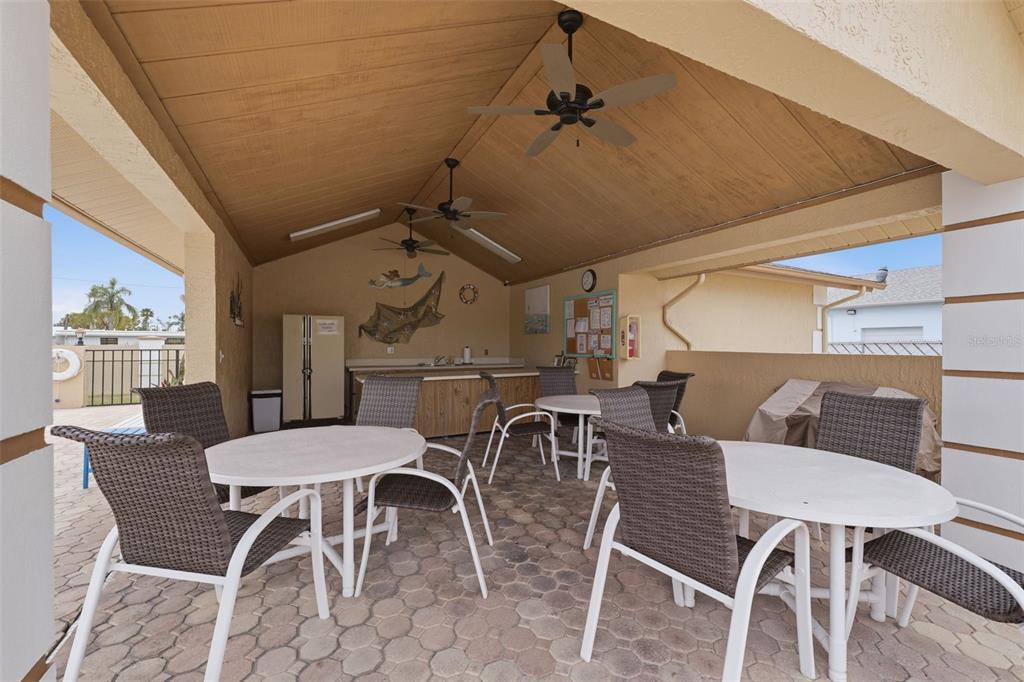 1804 Rising Sun Drive, Unit 1804 Holiday, FL 34690 - Photo 28 of 31 a view of a dining room with furniture