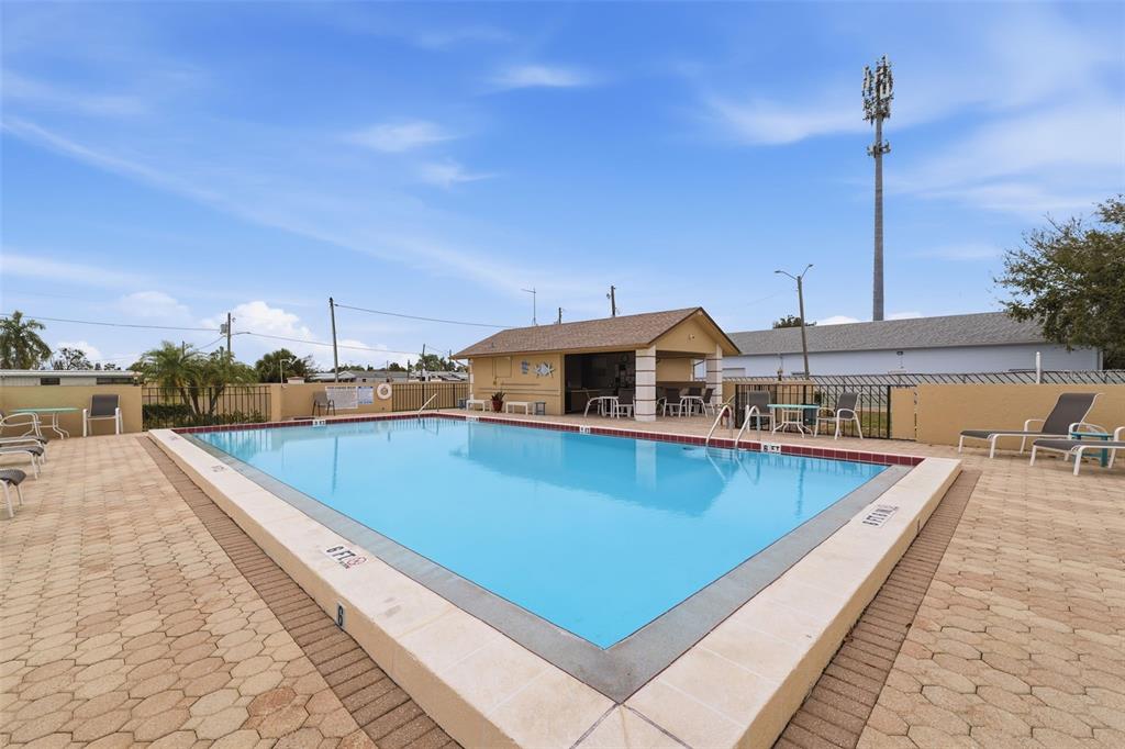 1804 Rising Sun Drive, Unit 1804 Holiday, FL 34690 - Photo 31 of 31 a view of a balcony with chairs