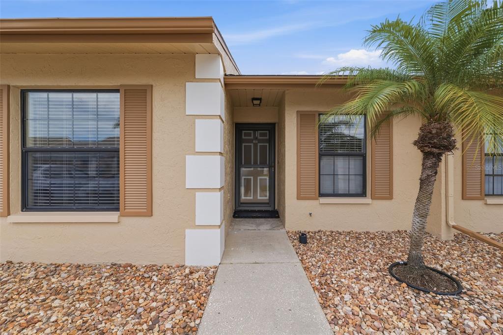 1804 Rising Sun Drive, Unit 1804 Holiday, FL 34690 - Photo 6 of 31 a front view of a house