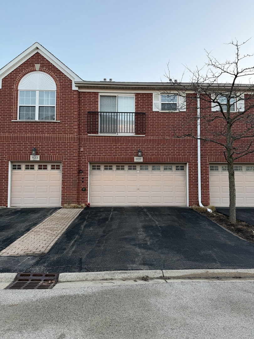1137 Brent Road Northbrook, IL 60062 - Photo 1 of 25 a view of a house with a yard