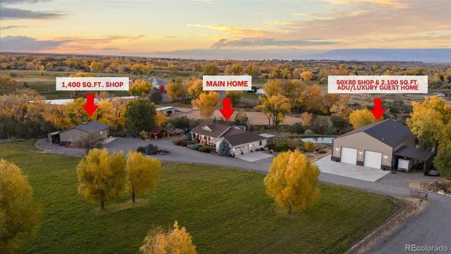 a view of swimming pool with a garden and seating area