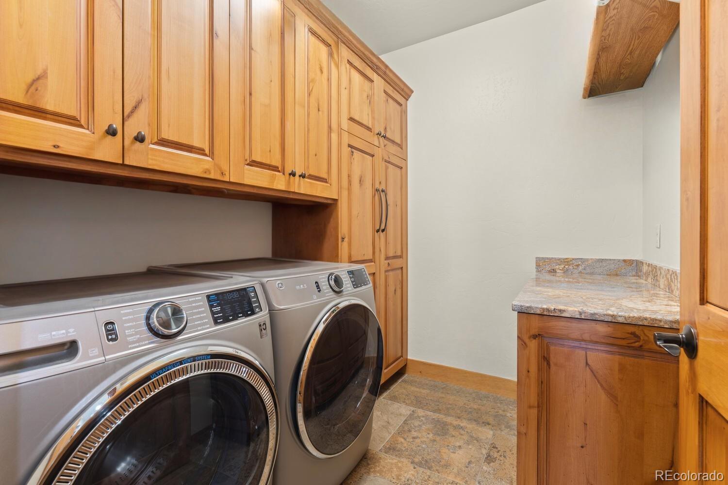 60075 Oak Grove Road Montrose, CO 81403 - Photo 23 of 50 a utility room with dryer and washer