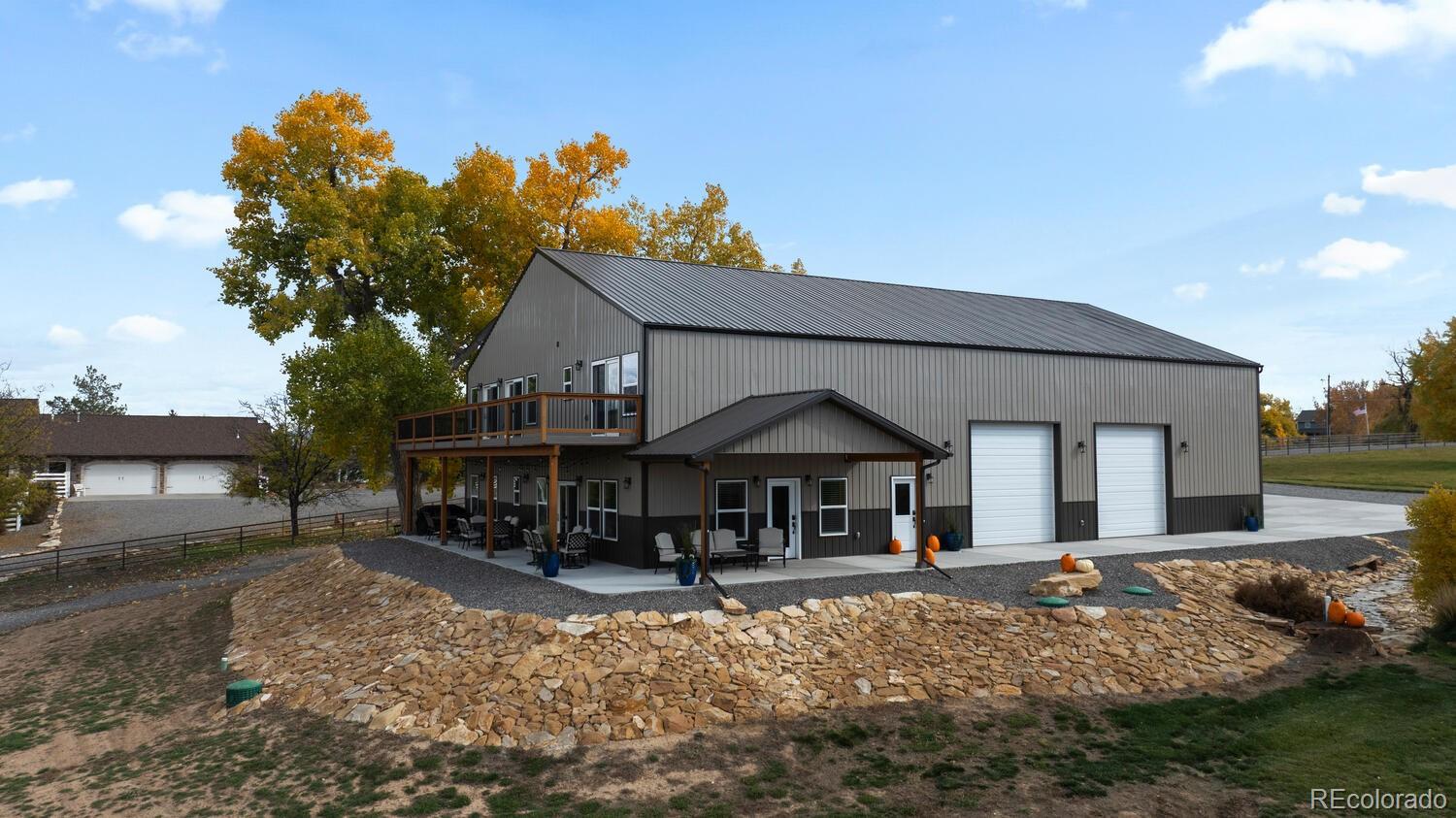 60075 Oak Grove Road Montrose, CO 81403 - Photo 27 of 50 a front view of a house with garden