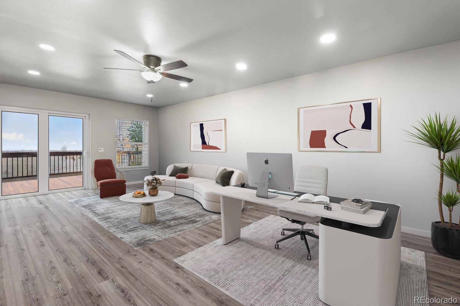 60075 Oak Grove Road Montrose, CO 81403 - Photo 40 of 50 a living room with furniture a flat screen tv and a potted plant