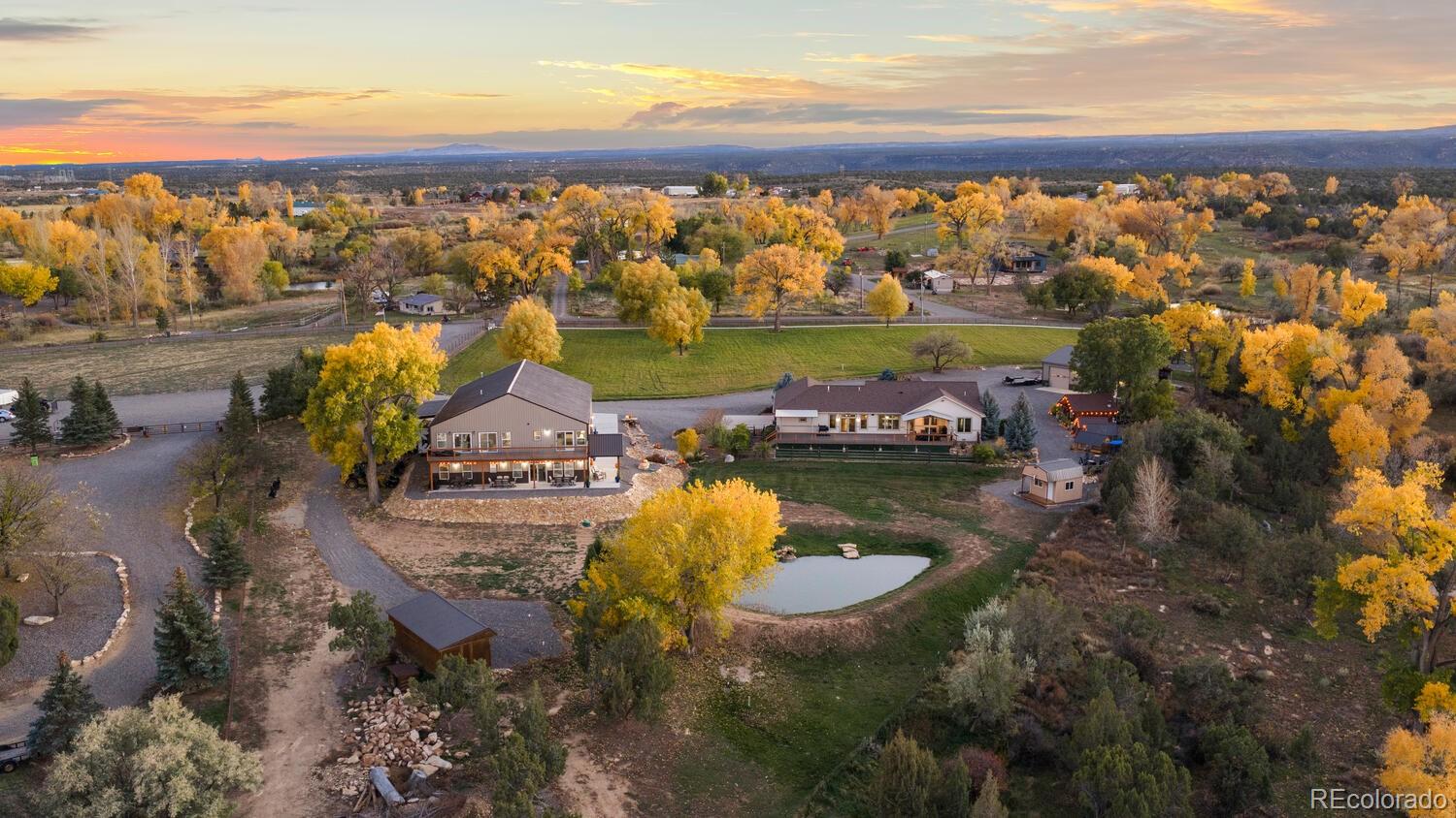 60075 Oak Grove Road Montrose, CO 81403 - Photo 48 of 50 an aerial view of residential houses with outdoor space