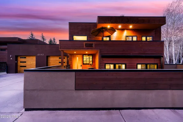 a house view with a backyard space