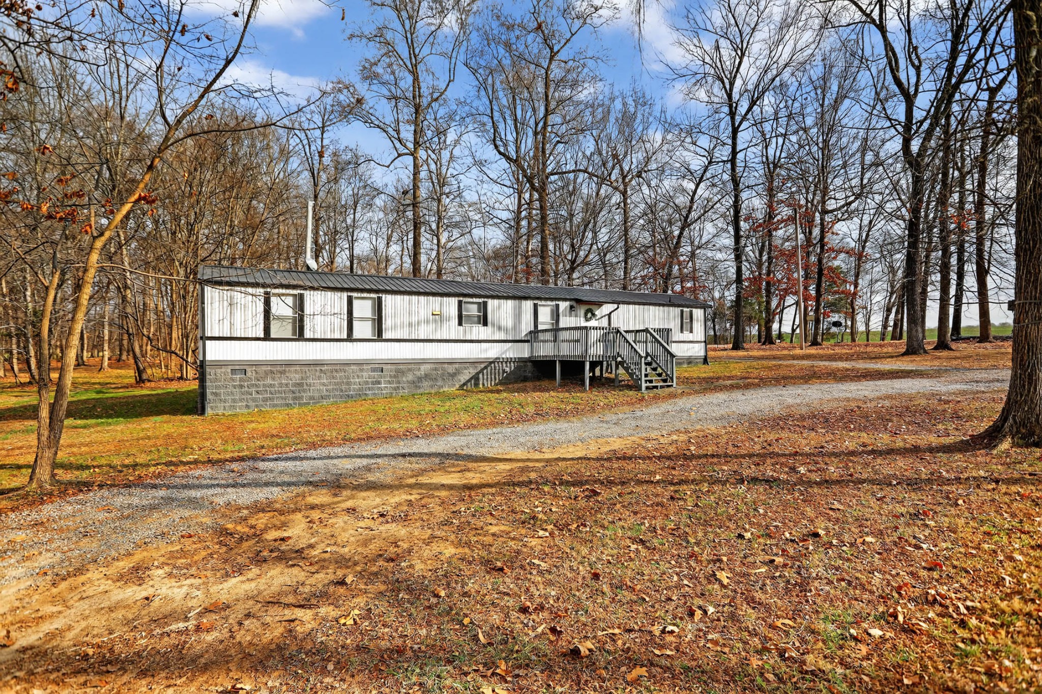 a view of a house with snow on the floor