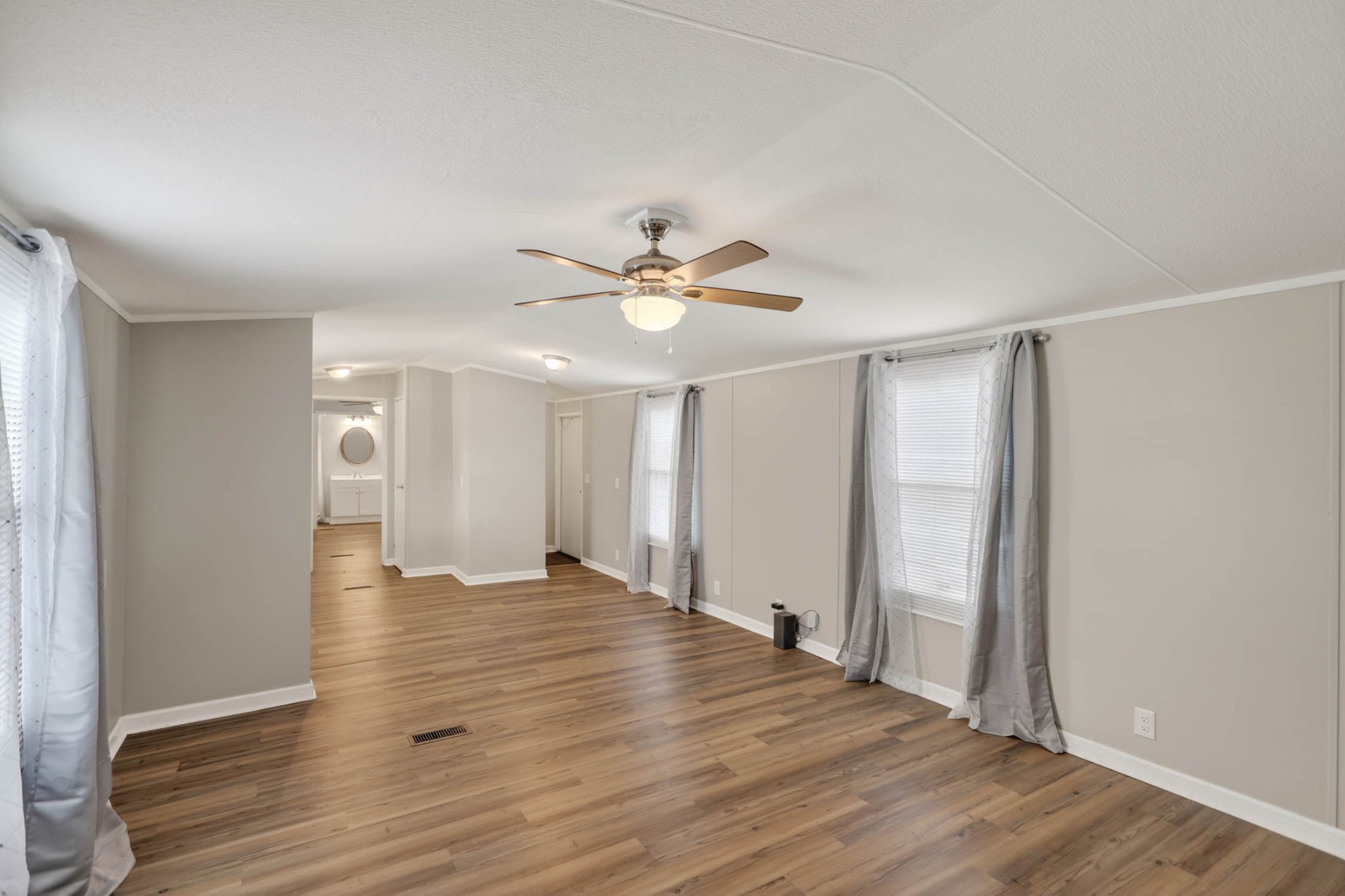 4337 Woodrow Wilson Road White House, TN 37188 - Photo 12 of 28 wooden floor in an empty room with a window