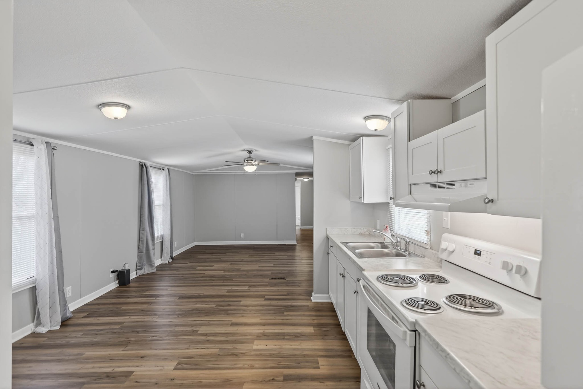 4337 Woodrow Wilson Road White House, TN 37188 - Photo 17 of 28 a kitchen with a stove and a refrigerator