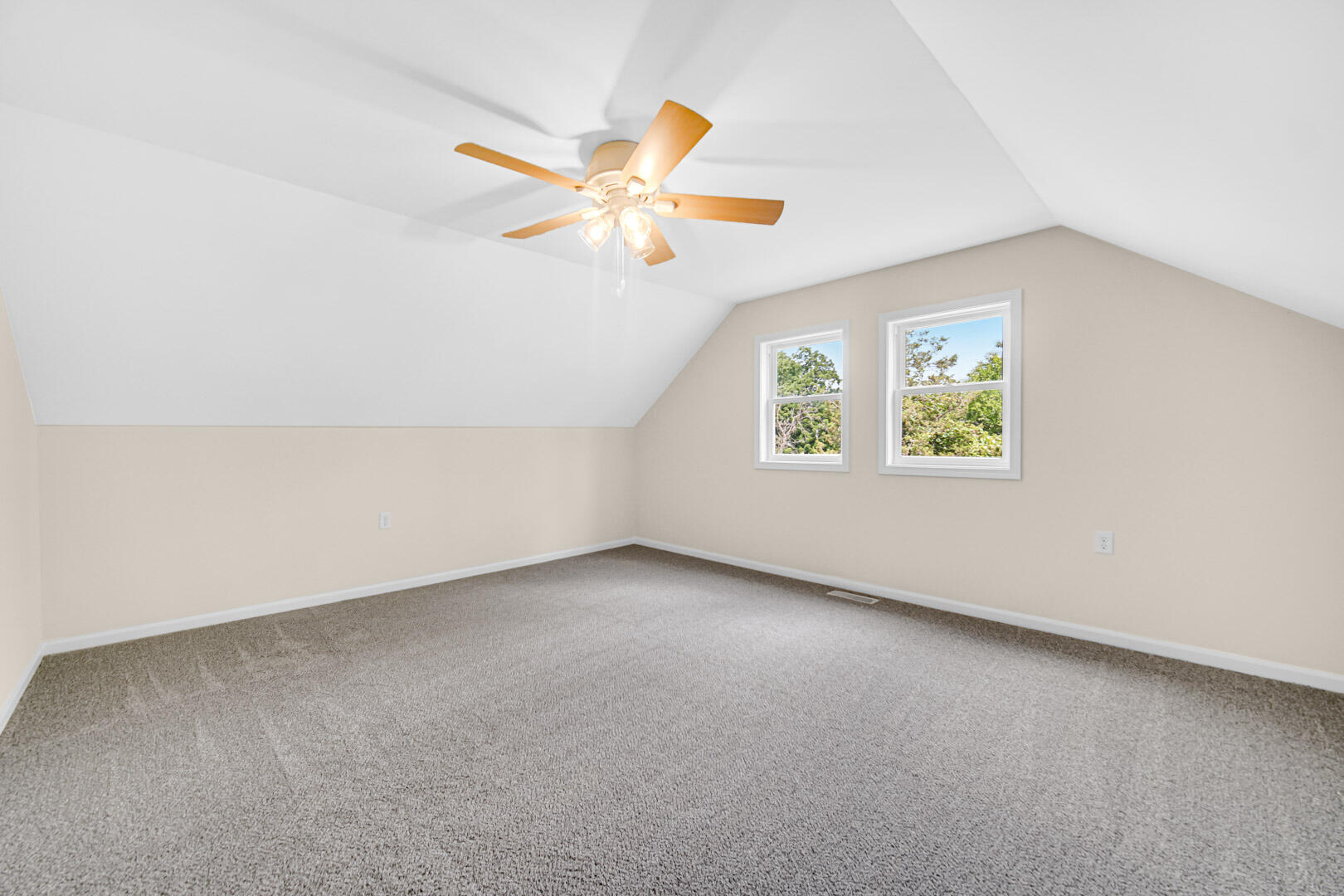 739 Fremont Road Valparaiso, IN 46385 - Photo 18 of 26 an empty room with windows and fan