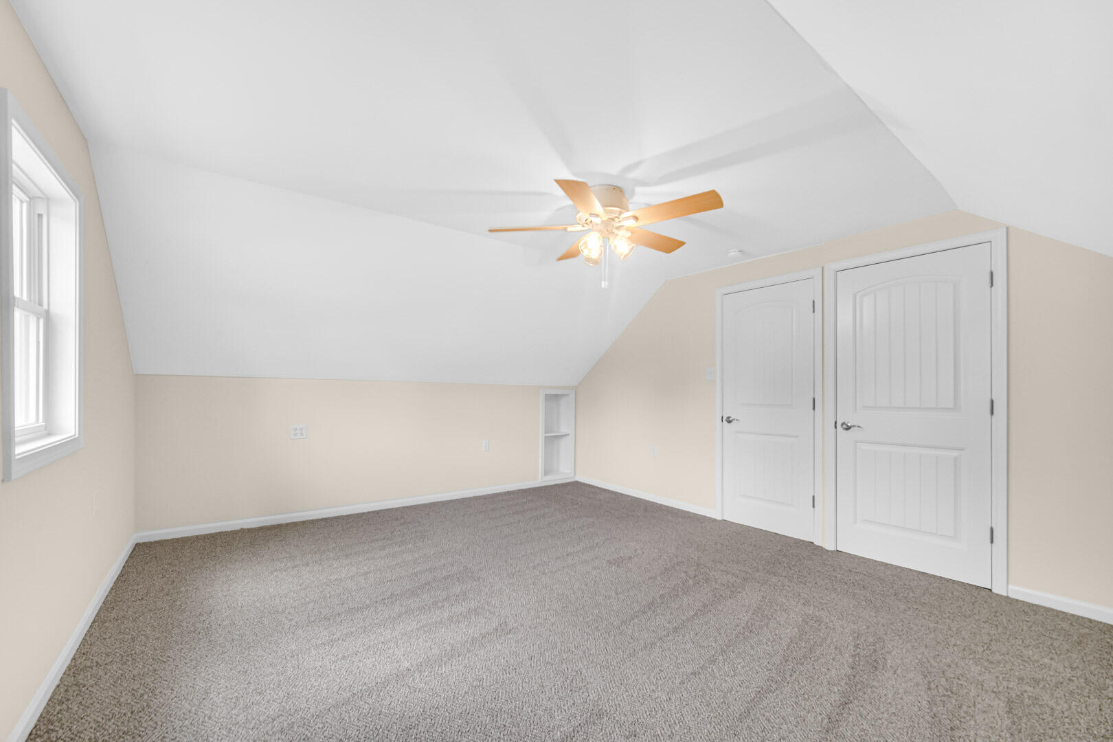 739 Fremont Road Valparaiso, IN 46385 - Photo 19 of 26 an empty room with a window and a chandelier fan