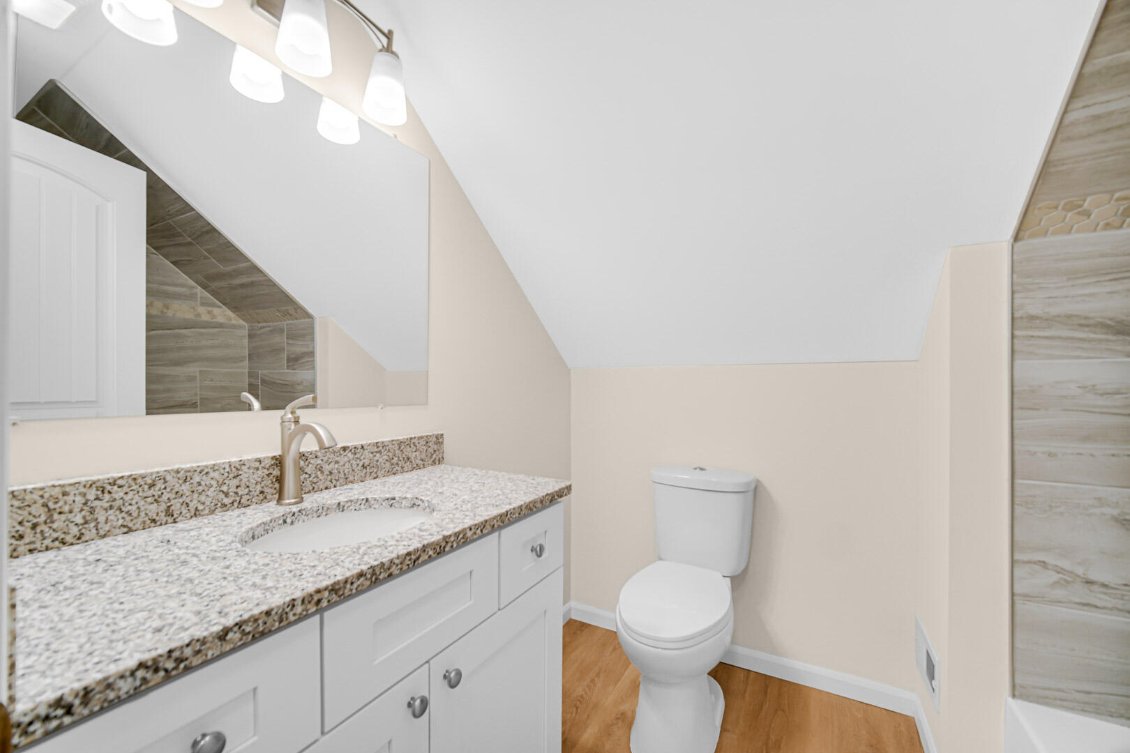 739 Fremont Road Valparaiso, IN 46385 - Photo 20 of 26 a bathroom with a granite countertop sink and a toilet