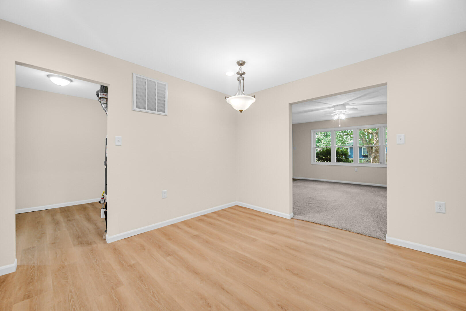 739 Fremont Road Valparaiso, IN 46385 - Photo 9 of 26 wooden floor in an empty room with a window
