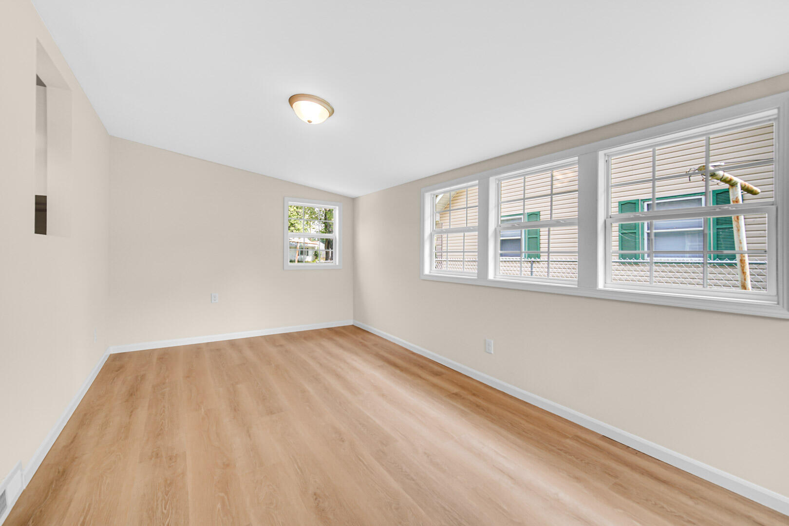 739 Fremont Road Valparaiso, IN 46385 - Photo 10 of 26 a view of an empty room with a window