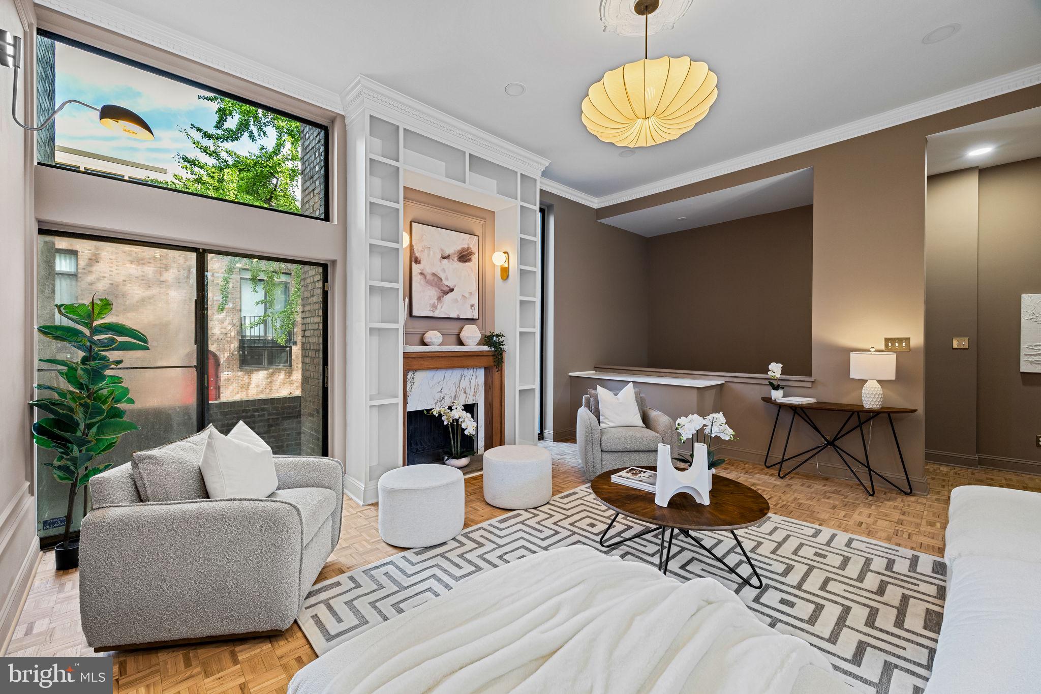242 Locust Street Philadelphia, PA 19106 - Photo 14 of 62 a living room with furniture and a large window