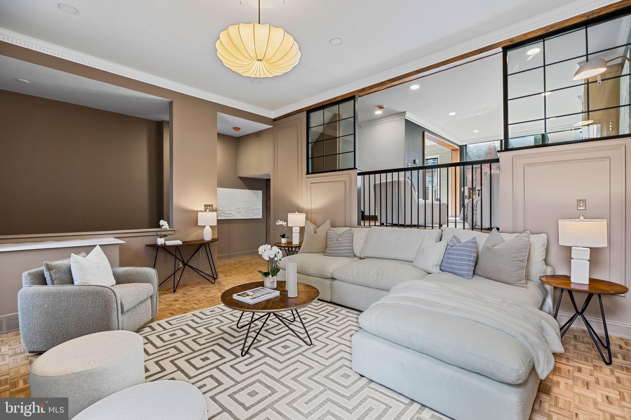 242 Locust Street Philadelphia, PA 19106 - Photo 16 of 62 a living room with furniture a lamp and a rug