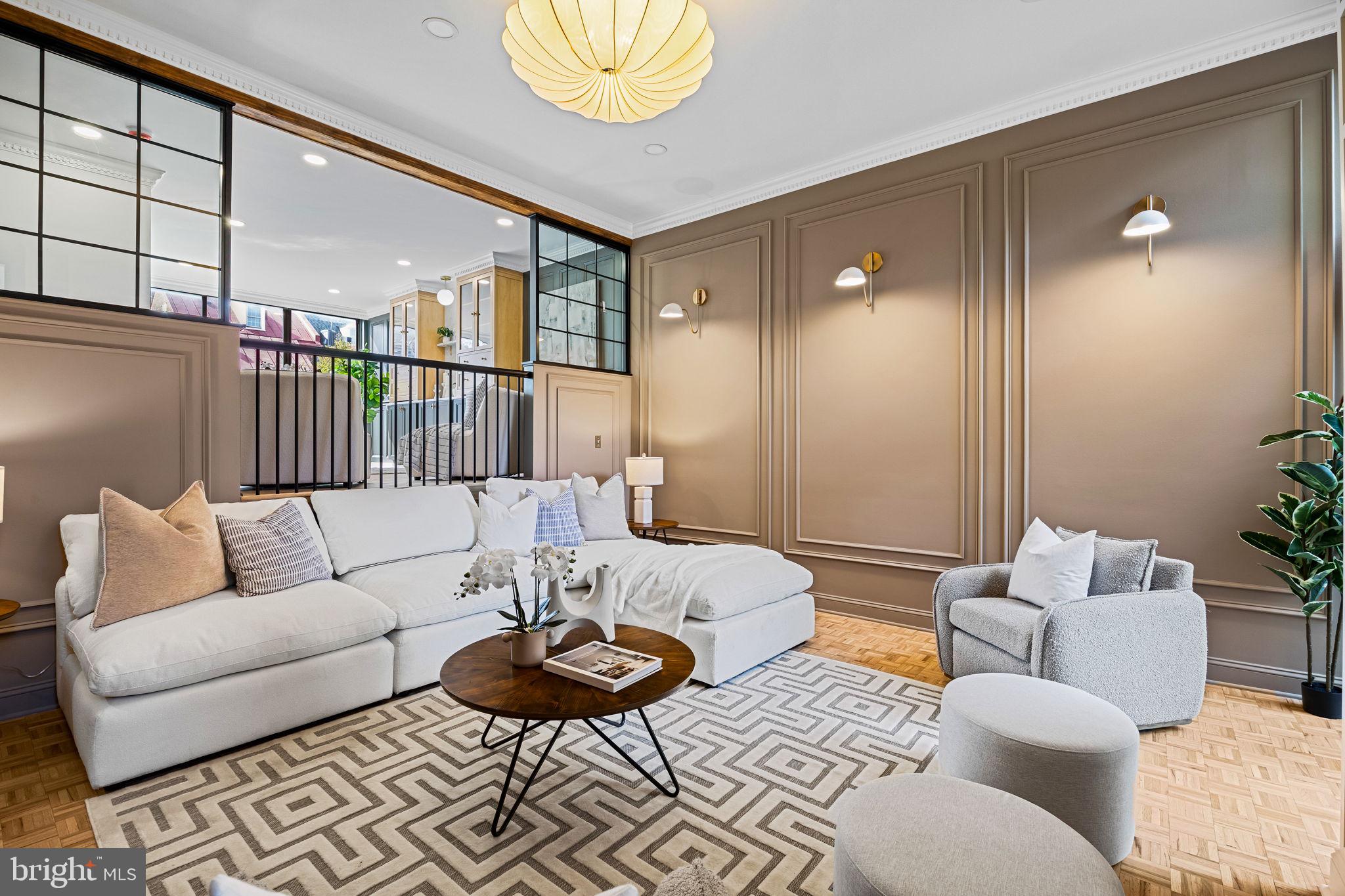242 Locust Street Philadelphia, PA 19106 - Photo 17 of 62 a living room with furniture and a large window