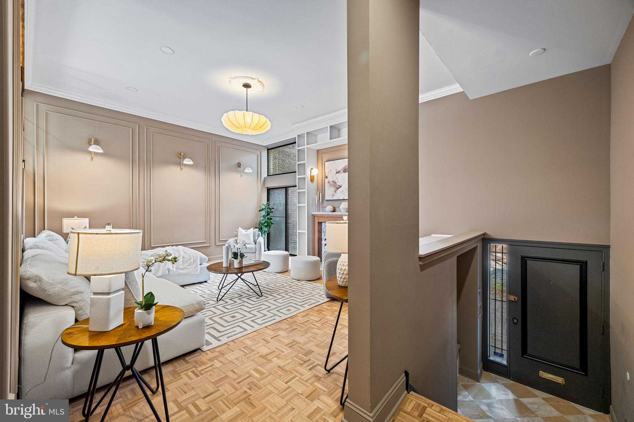 242 Locust Street Philadelphia, PA 19106 - Photo 20 of 62 a living room with furniture and wooden floor