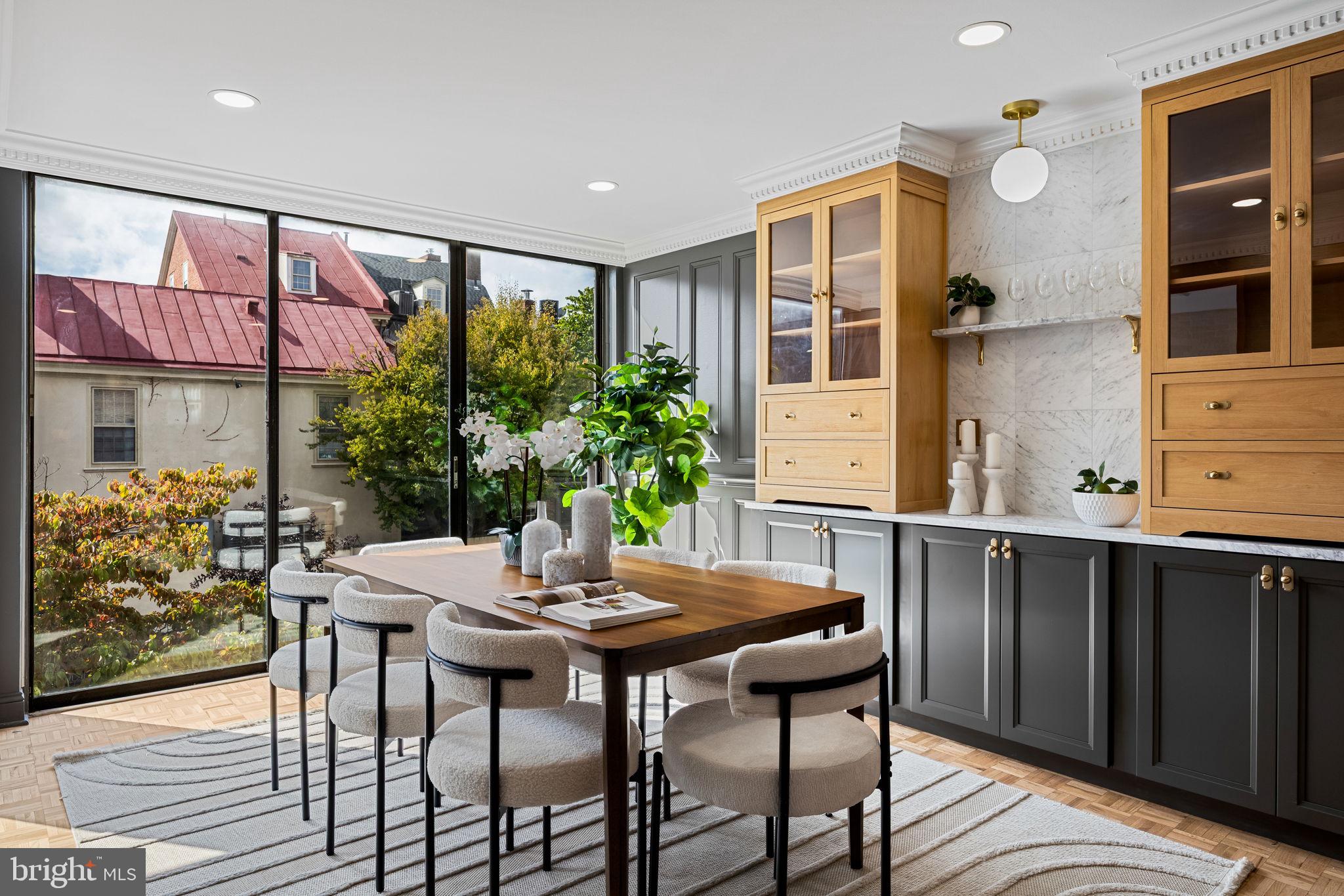 242 Locust Street Philadelphia, PA 19106 - Photo 2 of 62 a view of a dining room with furniture window and wooden floor