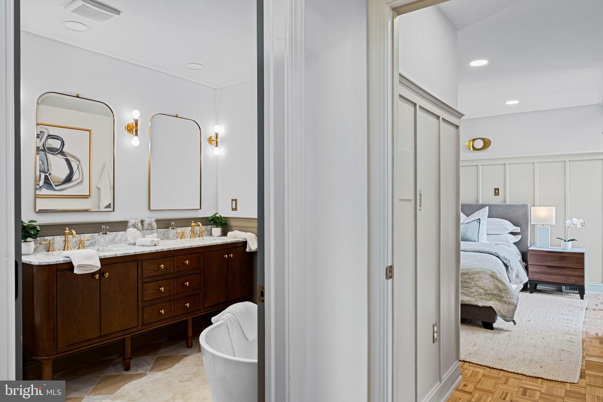 242 Locust Street Philadelphia, PA 19106 - Photo 34 of 62 a bathroom with a toilet sink and mirror