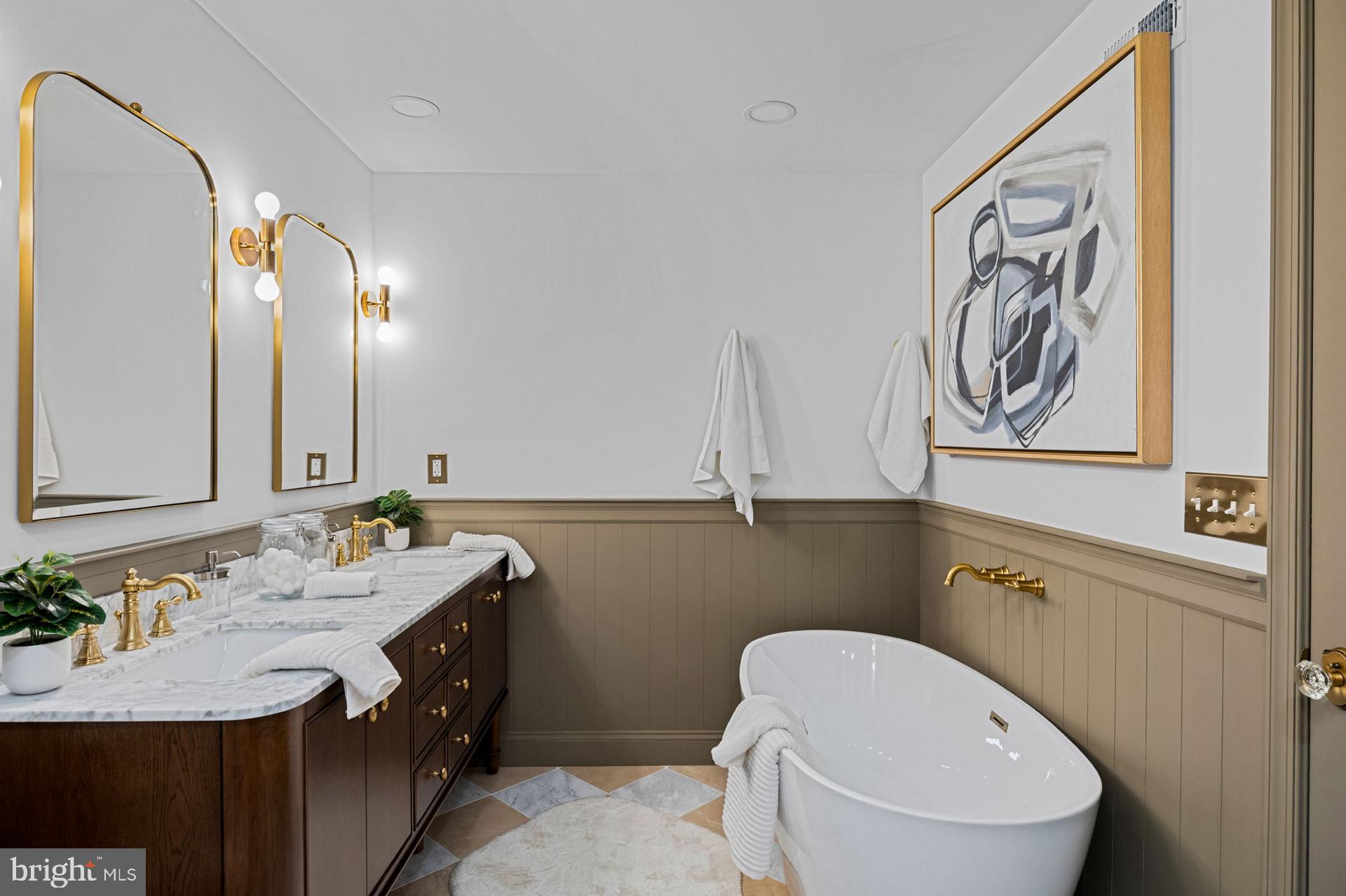 242 Locust Street Philadelphia, PA 19106 - Photo 37 of 62 a bathroom with a sink a toilet and mirror