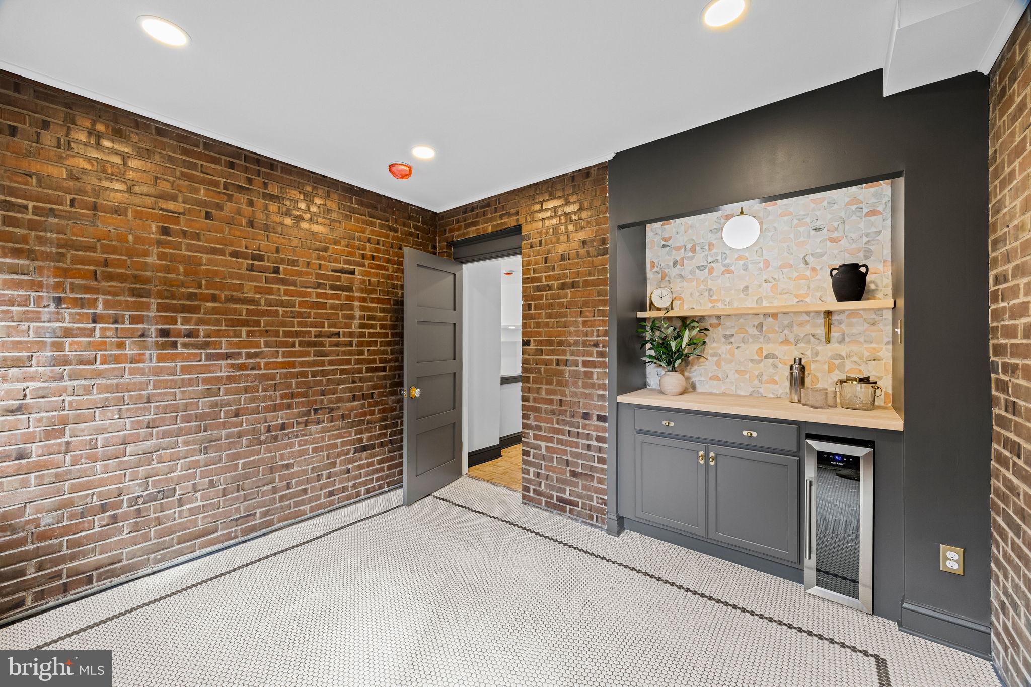 242 Locust Street Philadelphia, PA 19106 - Photo 48 of 62 a bathroom with a sink and a mirror