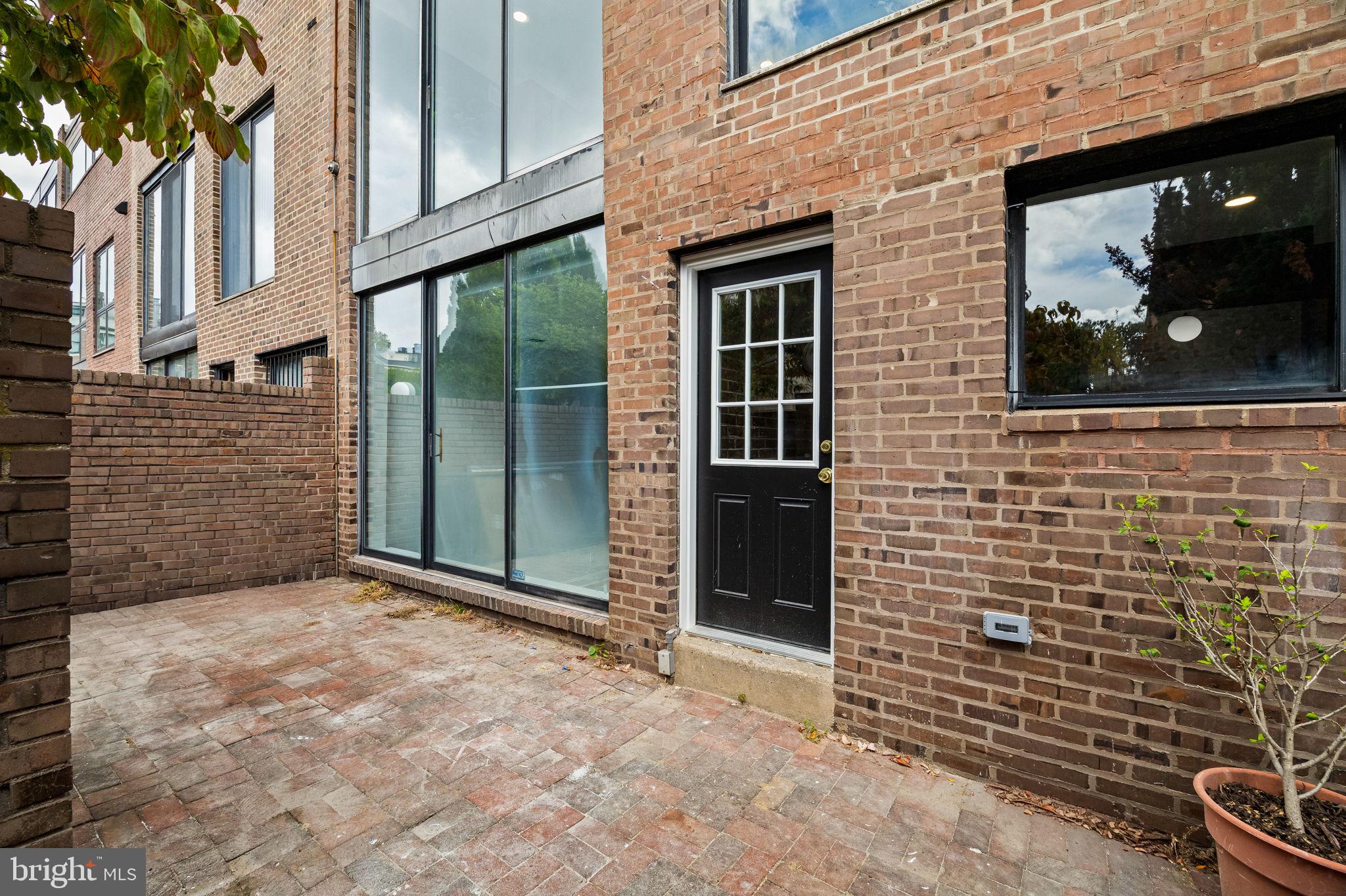 242 Locust Street Philadelphia, PA 19106 - Photo 52 of 62 a view of a brick house with windows