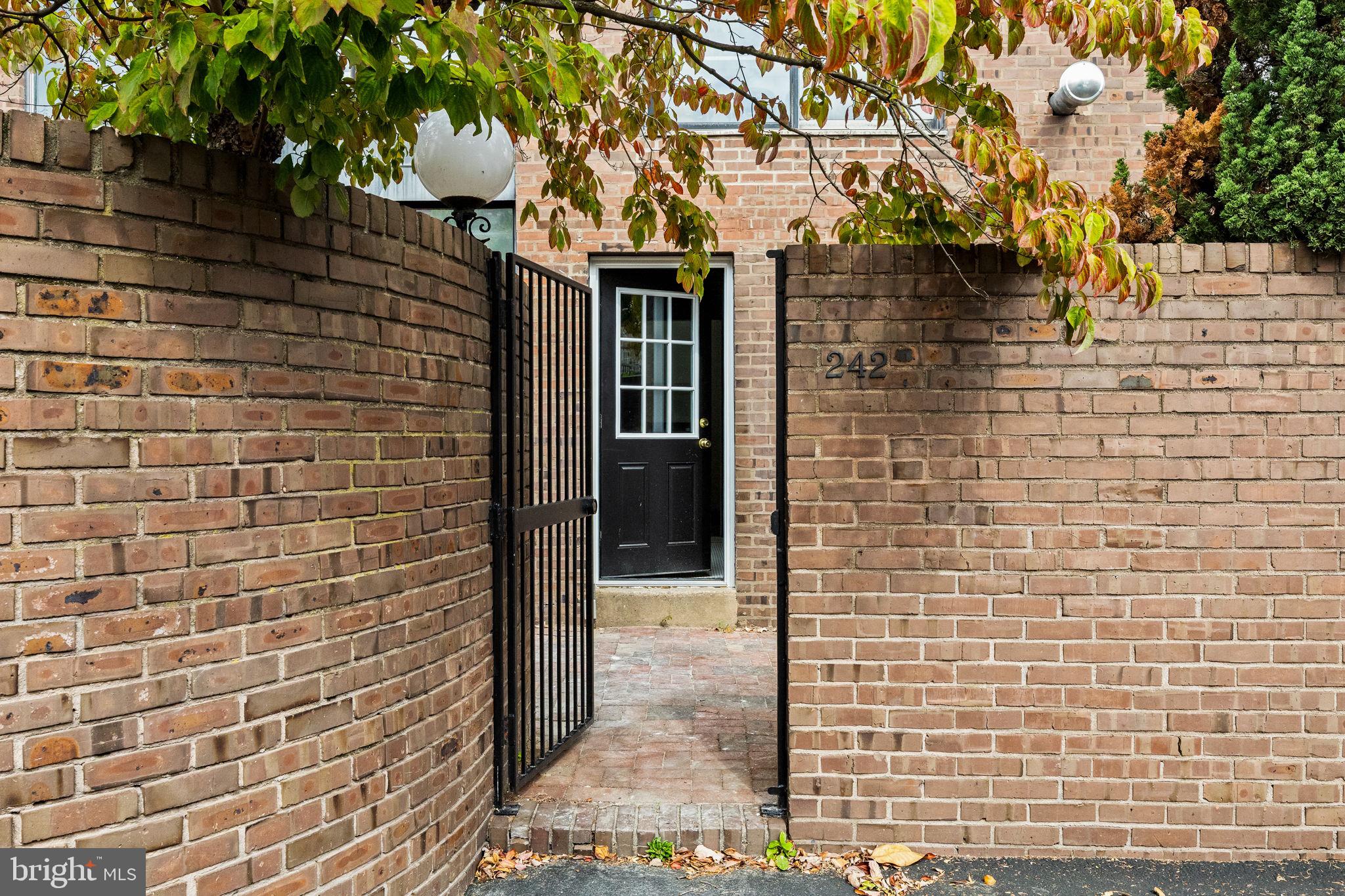 242 Locust Street Philadelphia, PA 19106 - Photo 53 of 62 a brick building with a glass door