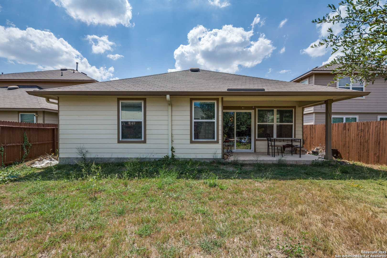 10415 Rhyder Ridge San Antonio, TX 78254 - Photo 24 of 25 a front view of a house with garden