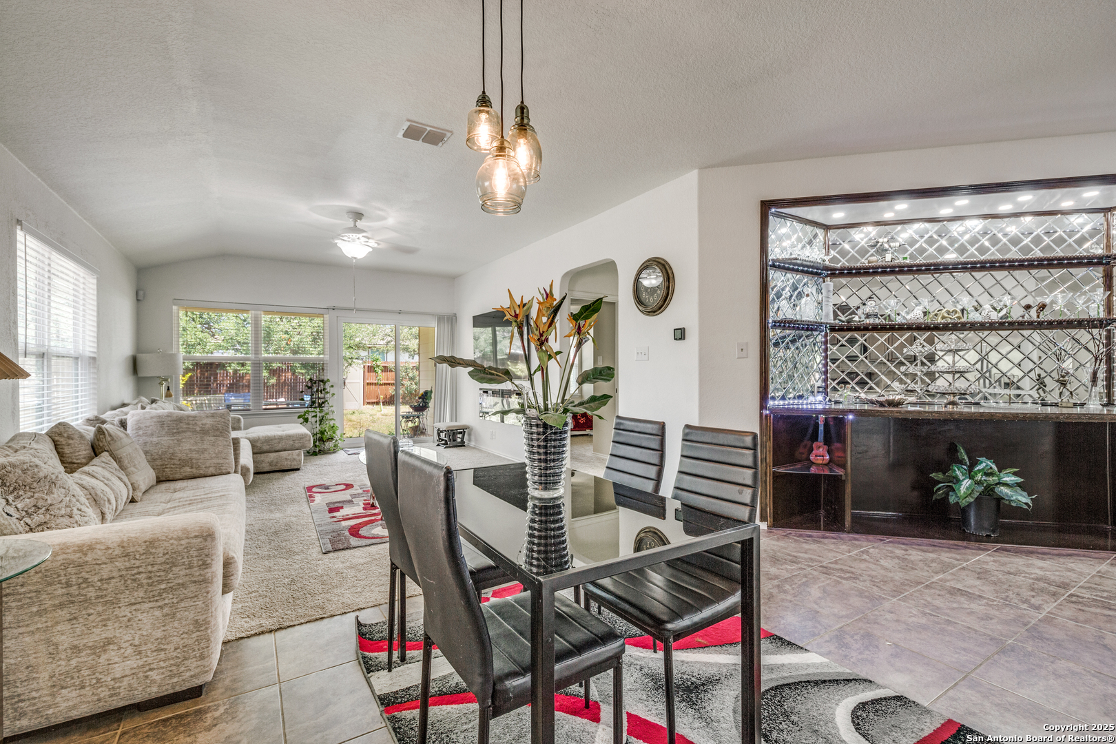 10415 Rhyder Ridge San Antonio, TX 78254 - Photo 6 of 25 a living room with furniture and a large window
