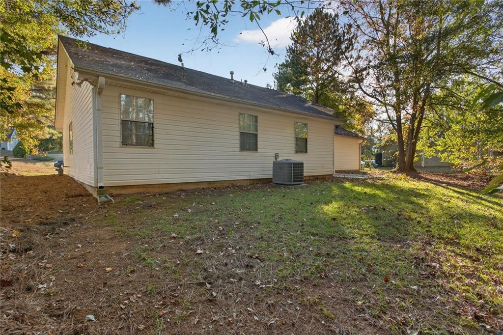 218 Nicki Court Hampton, GA 30228 - Photo 2 of 17 a view of a house with a yard