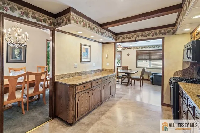 a view of a livingroom with furniture and a table