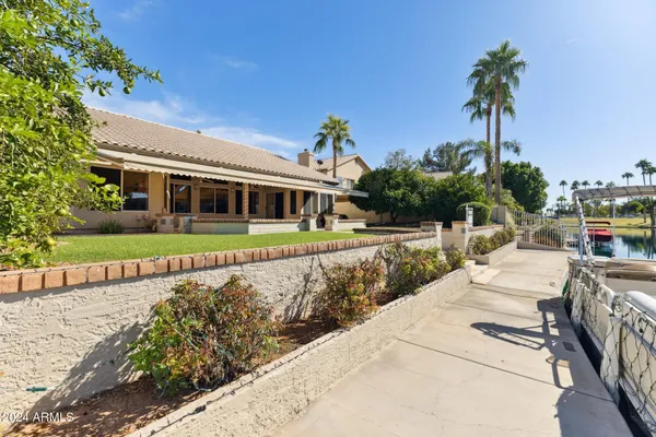 a view of a house with a swimming pool