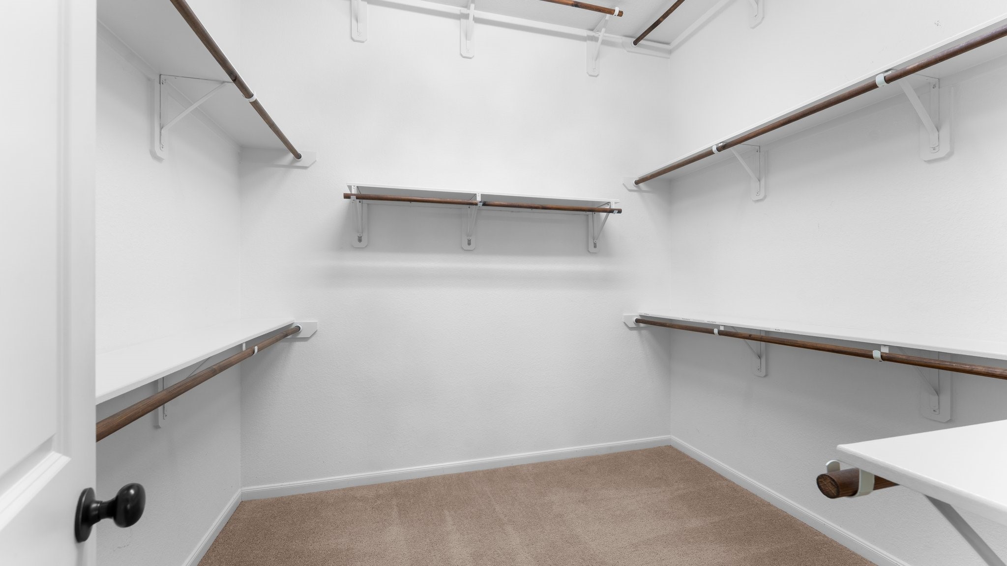 14 Painted Post Place Spring, TX 77389 - Photo 34 of 49 ample walk in closet with third row of rods.