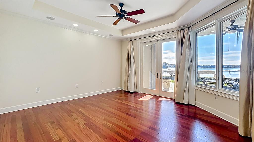 660 Osceola Avenue, Unit 101 Winter Park, FL 32789 - Photo 24 of 65 wooden floor in an empty room with a window
