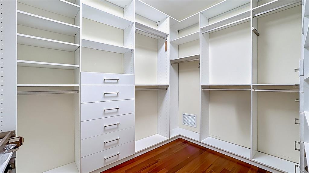 660 Osceola Avenue, Unit 101 Winter Park, FL 32789 - Photo 33 of 65 a view of walk in closet with empty racks